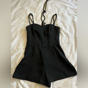 Bebe black romper